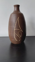 Load and play video in Gallery viewer, Vintage handmade vase with etched design
